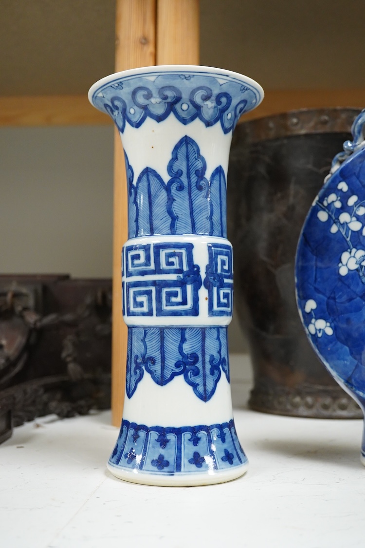 A Chinese blue and white prunus flower moon-flask and a Gu vase, largest 30cm high